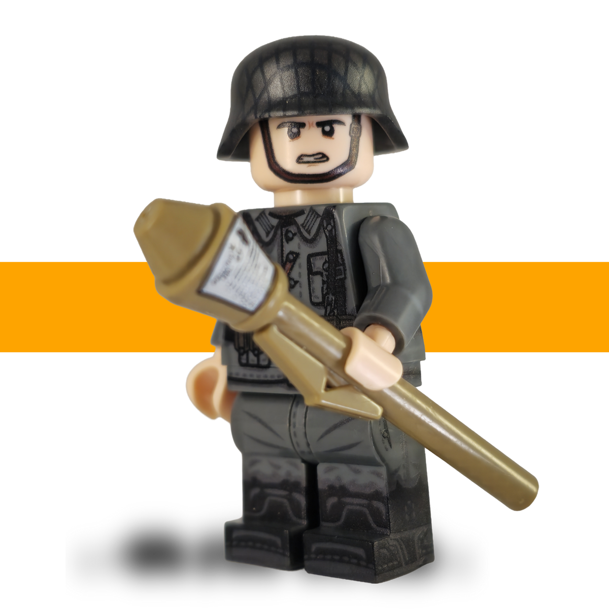 German WW2 LEGO-compatible anti-tank minifigure holding a tan miniature panserfaust launcher, with a grey uniform and net-pattern helmet
