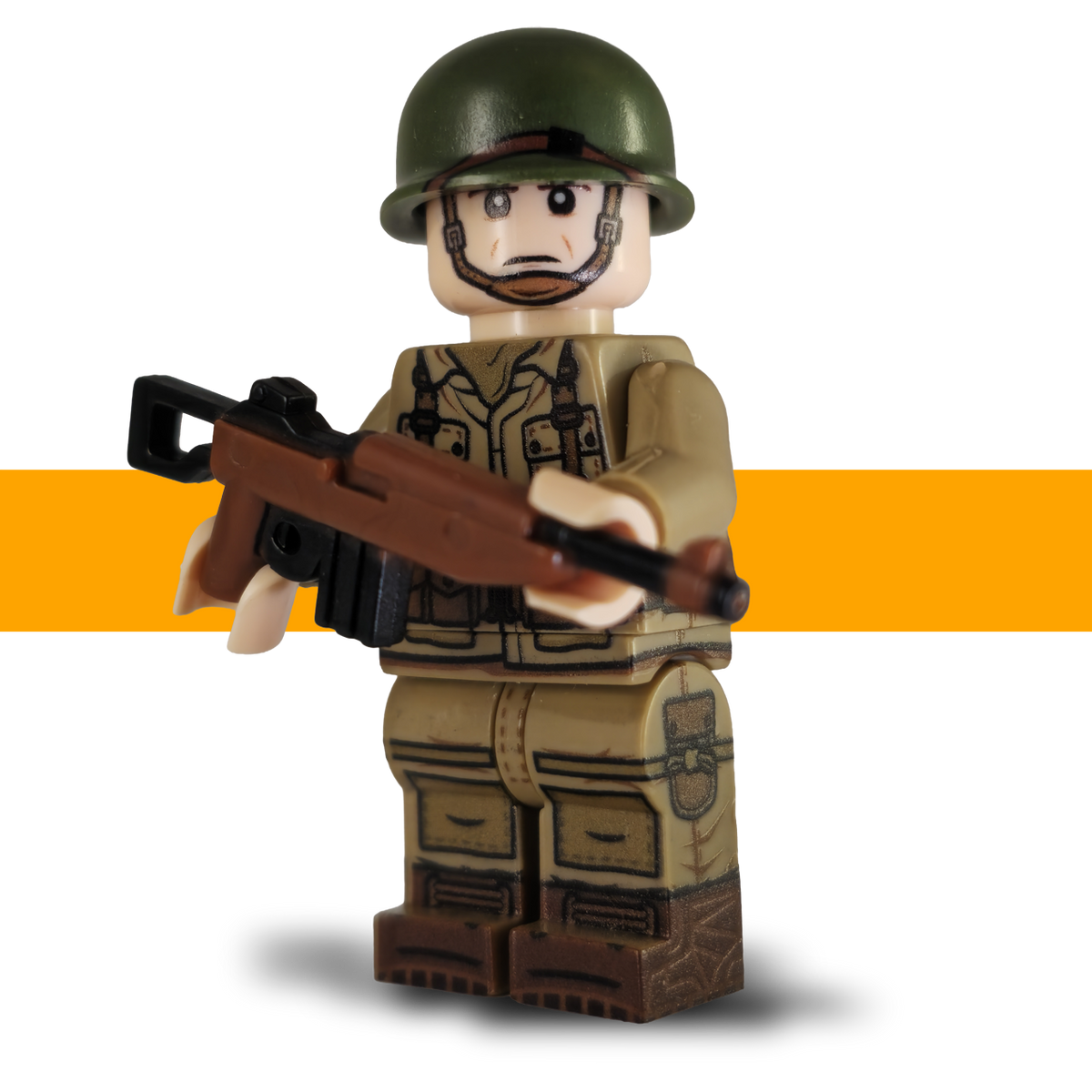 US Airborne WW2 LEGO-compatible minifigure holding a miniature carbine, with a dark tan uniform and green helmet